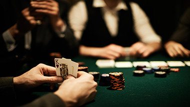 poker hand with king showing